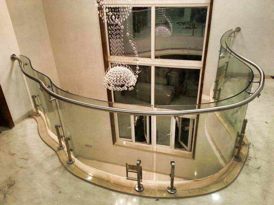 CURVED GLASS HANDRAIL FOR STAIRS IN KOCHI